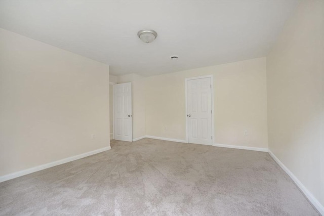 1030 Oak St, Dighton, MA 02764 - spare room featuring carpet flooring and baseboards