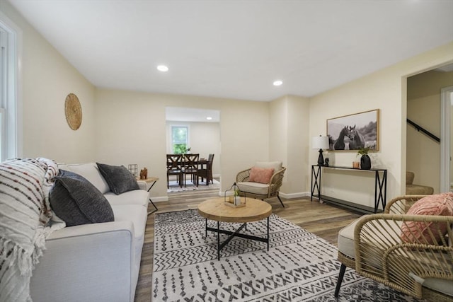 1030 Oak St, Dighton, MA 02764 - living area with wood finished floors, stairs, and recessed lighting