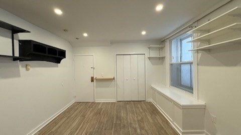 interior space with dark wood-type flooring