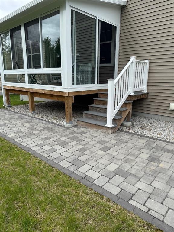 186 Stone Hill Dr Unit 186, Northbridge, MA 01588 - view of patio with a sunroom