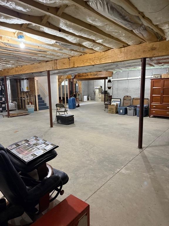 186 Stone Hill Dr Unit 186, Northbridge, MA 01588 - unfinished basement featuring stairs
