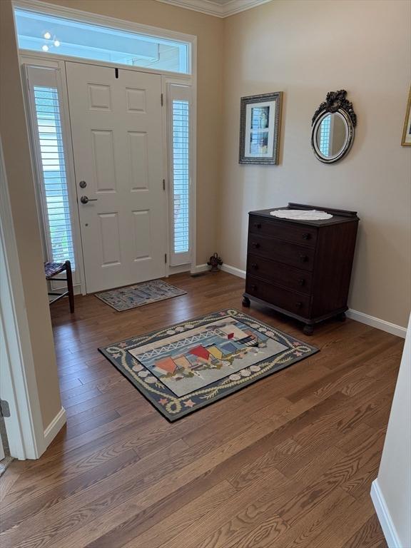 186 Stone Hill Dr Unit 186, Northbridge, MA 01588 - entrance foyer featuring wood finished floors, baseboards, and crown molding