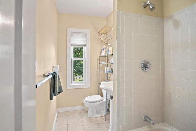 35 Harvard St, Winchester, MA 01890 - full bath with tile patterned floors, toilet, shower / washtub combination, and baseboards