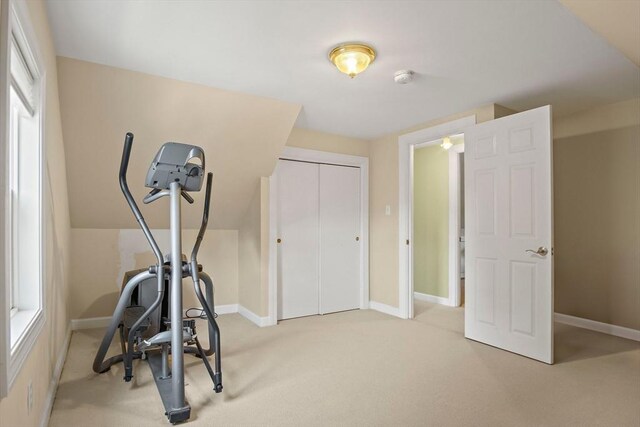 35 Harvard St, Winchester, MA 01890 - workout room featuring carpet flooring and baseboards
