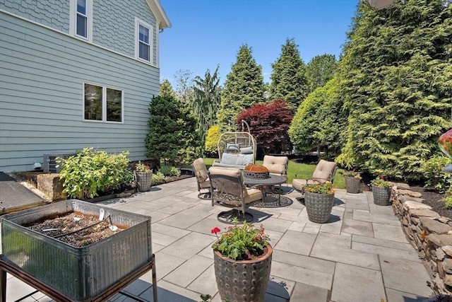 35 Harvard St, Winchester, MA 01890 - view of patio / terrace featuring a garden