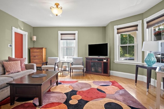 35 Harvard St, Winchester, MA 01890 - living room featuring wood finished floors and baseboards