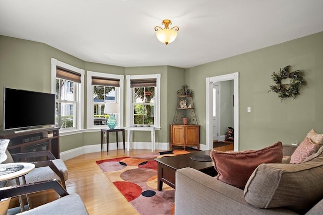 35 Harvard St, Winchester, MA 01890 - living area featuring wood finished floors and baseboards
