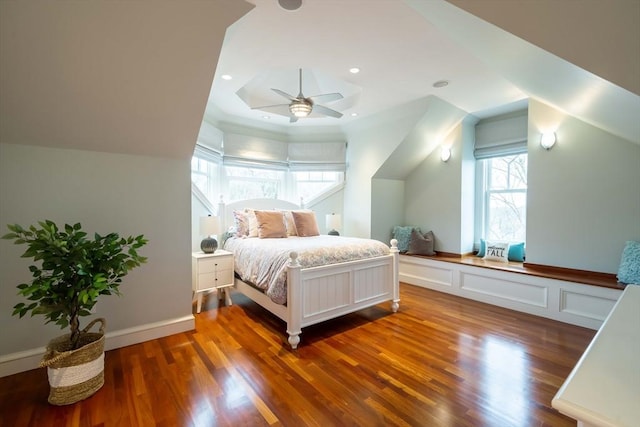 bedroom featuring ceiling fan and dark hardwood / wood-style floors