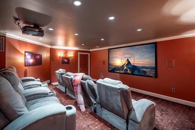 cinema room featuring ornamental molding