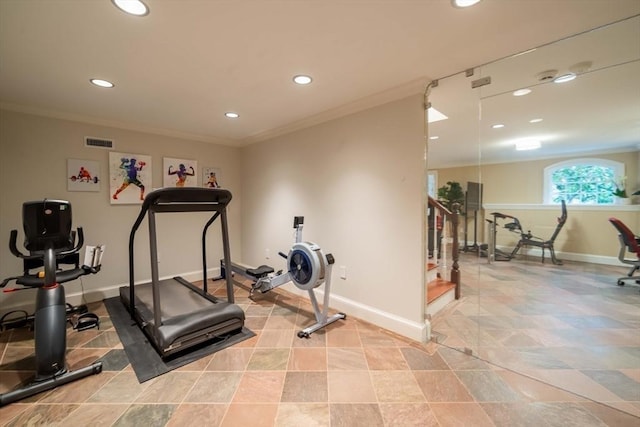 workout room with crown molding