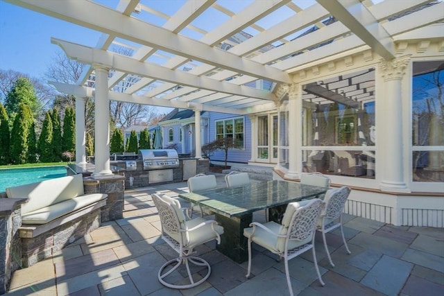 view of patio featuring grilling area, area for grilling, and a pergola