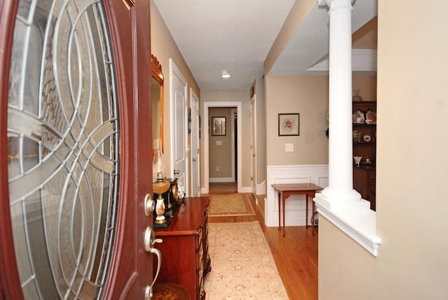 16 John Francis Ln Unit 16, Acton, MA 01720 - entrance foyer with decorative columns, wood finished floors, and wainscoting