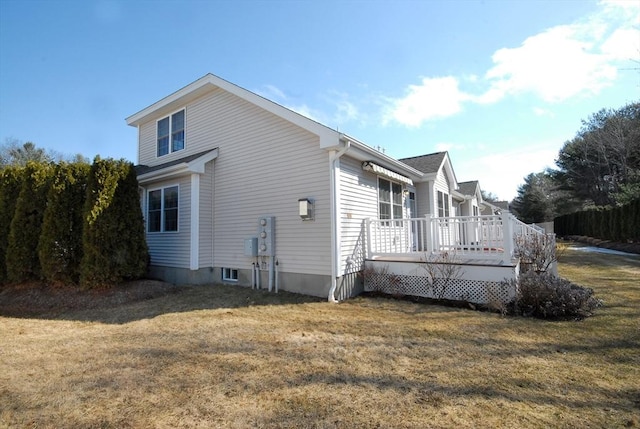 16 John Francis Ln Unit 16, Acton, MA 01720 - view of side of home with a wooden deck and a yard
