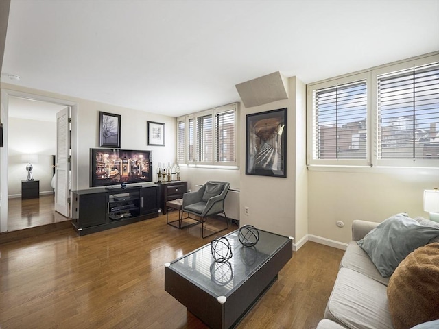 living room featuring dark hardwood / wood-style floors