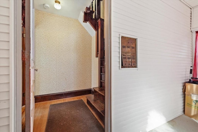 hallway with wood finished floors