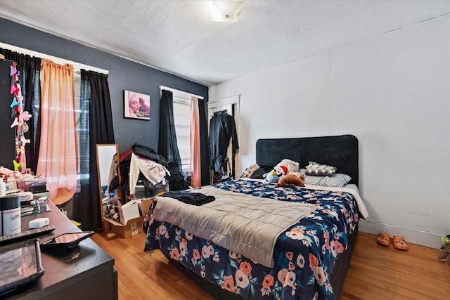 bedroom featuring hardwood / wood-style floors