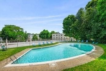 pool featuring fence