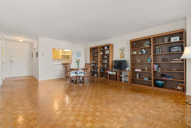 interior space featuring baseboards