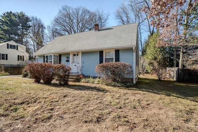 view of front of home with a front lawn