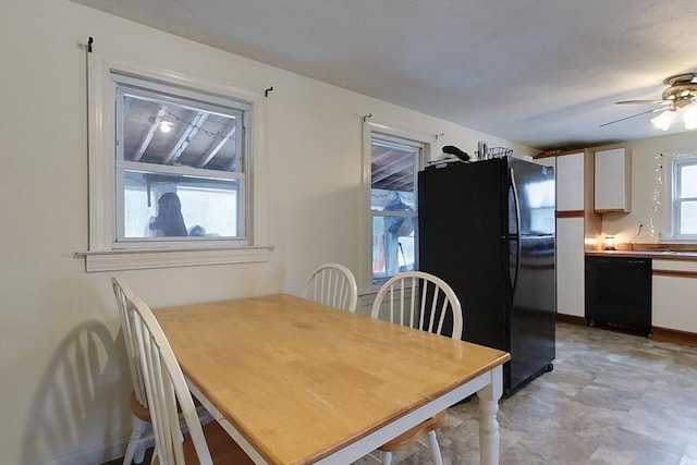 dining room featuring ceiling fan