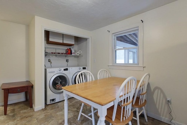 dining area with washing machine and clothes dryer