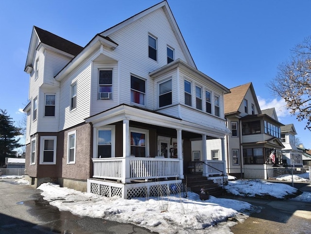 view of front of property featuring covered porch