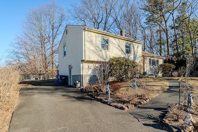 view of front of home with a chimney