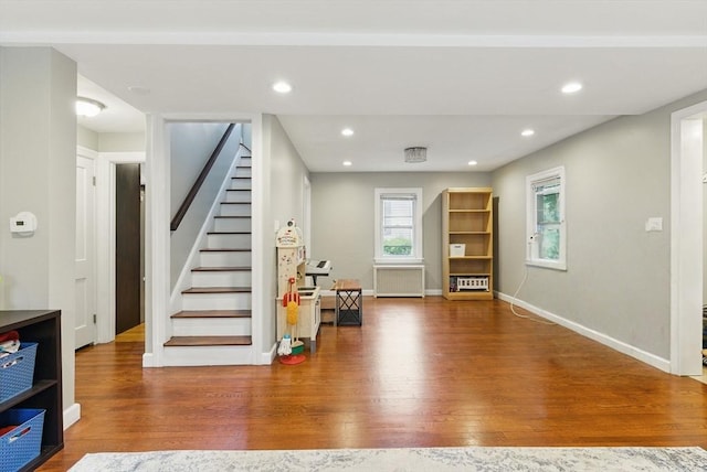 33 Walworth St, Worcester, MA 01602 - living area with wood finished floors, stairs, and recessed lighting
