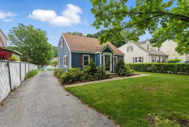 33 Walworth St, Worcester, MA 01602 - view of front facade with a chimney and a shingled roof