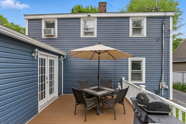 33 Walworth St, Worcester, MA 01602 - wooden terrace with french doors, grilling area, and outdoor dining space