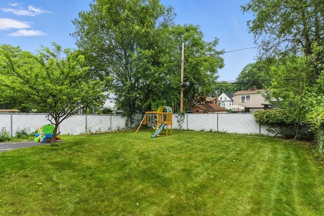 33 Walworth St, Worcester, MA 01602 - fenced backyard with a playground