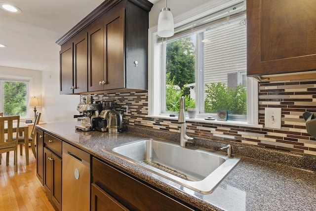 33 Walworth St, Worcester, MA 01602 - kitchen with healthy amount of natural light, light wood finished floors, decorative backsplash, recessed lighting, and stainless steel dishwasher