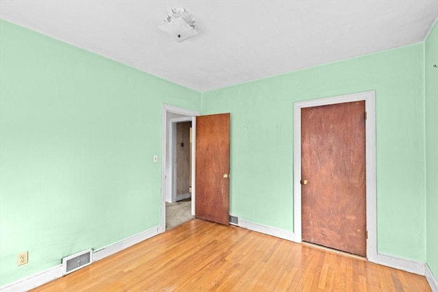 15 Rand St, Randolph, MA 02368 - unfurnished bedroom featuring light wood-style flooring and baseboards