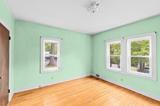 15 Rand St, Randolph, MA 02368 - unfurnished bedroom with multiple windows and wood-type flooring