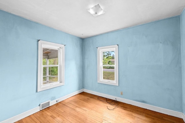 15 Rand St, Randolph, MA 02368 - spare room with plenty of natural light and wood-type flooring