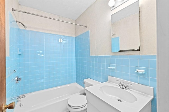 15 Rand St, Randolph, MA 02368 - bathroom featuring tub / shower combination, vanity, and tile walls