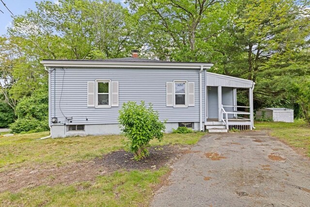 15 Rand St, Randolph, MA 02368 - view of front of property featuring a chimney and covered porch