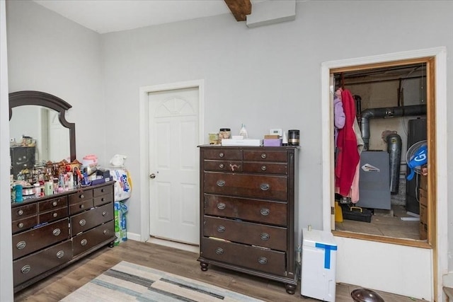 bedroom featuring wood-type flooring