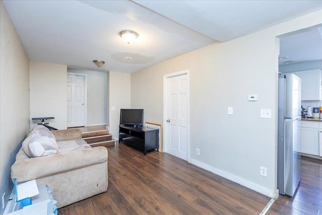 living room with dark wood-type flooring