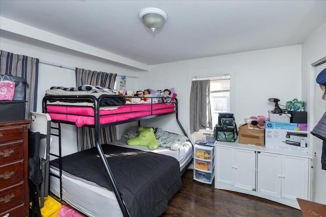 bedroom featuring dark hardwood / wood-style floors