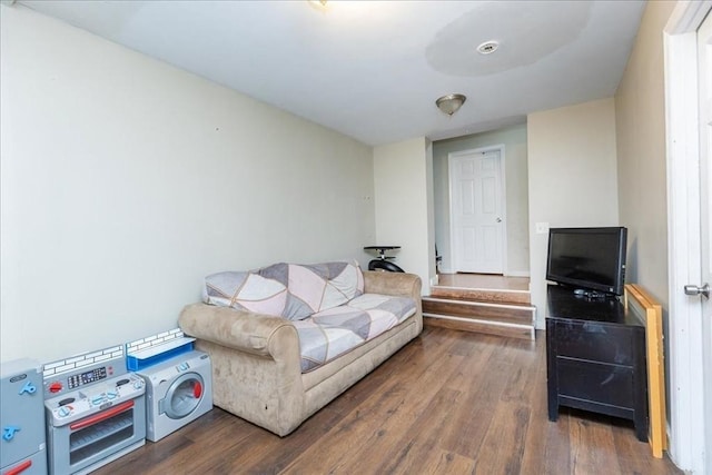 living room featuring dark wood-type flooring