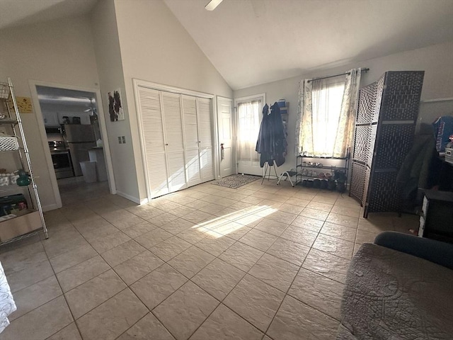 6 Gates St, Monson, MA 01057 - bedroom with a closet, light tile patterned flooring, high vaulted ceiling, and ceiling fan