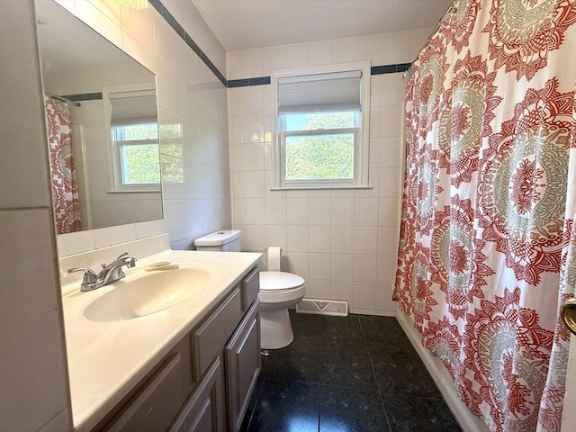6 Gates St, Monson, MA 01057 - bathroom with tile walls, vanity, healthy amount of natural light, tile patterned floors, and a shower with shower curtain