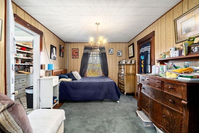 121 Purchase St, Milford, MA 01757 - carpeted bedroom with wooden walls and a chandelier