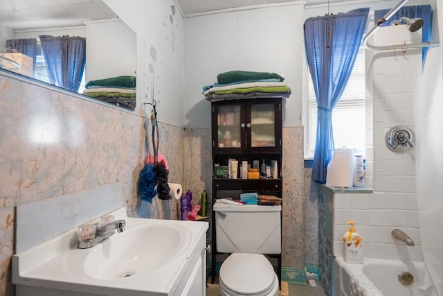 121 Purchase St, Milford, MA 01757 - full bathroom with toilet, plenty of natural light, vanity, shower / bath combination with curtain, and wainscoting