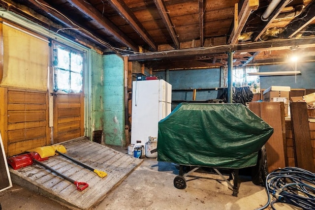 121 Purchase St, Milford, MA 01757 - basement with freestanding refrigerator