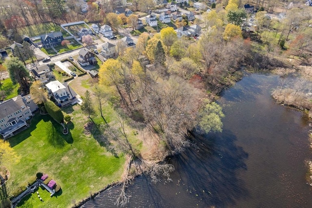 121 Purchase St, Milford, MA 01757 - aerial overview of property's location with a large body of water and nearby suburban area