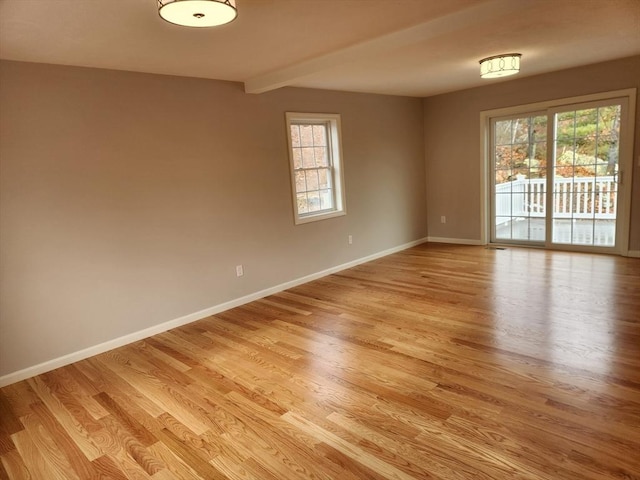 unfurnished room featuring light hardwood / wood-style flooring