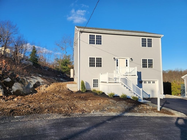 exterior space with a garage