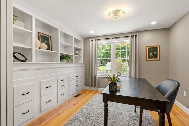 office area featuring light wood-style flooring, visible vents, baseboards, and recessed lighting